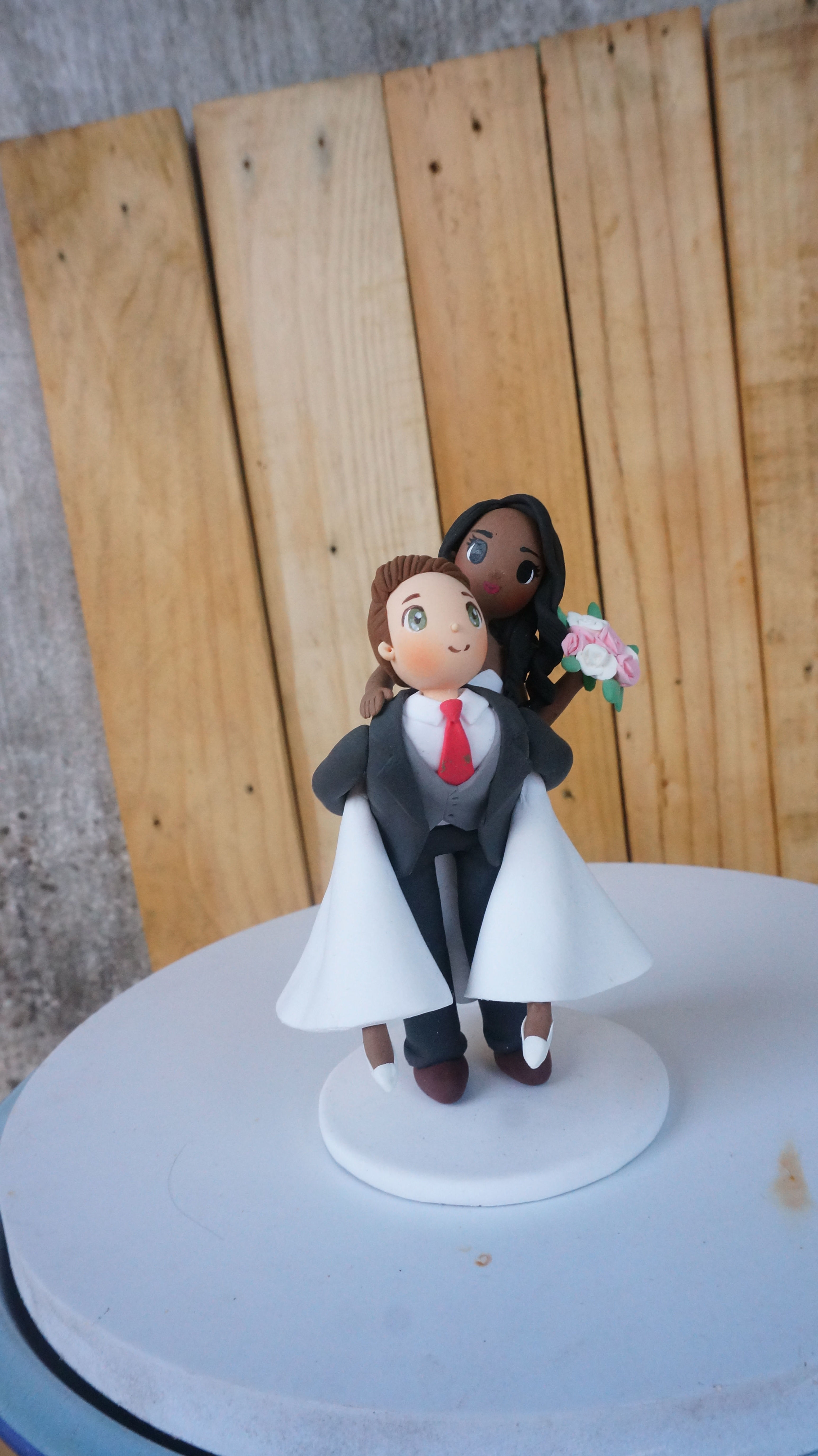 Picture of Piggy back Wedding Cake Topper, funny wedding topper