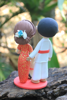 Picture of Japanese & Chinese wedding cake topper, Japanese Aikido groom, Traditional Chinese bride