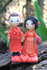 Picture of Chinese wedding cake topper, Chinese traditional wedding dress clay miniature