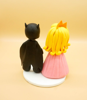 Picture of Batman and Princess Peach wedding cake topper