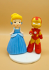 Picture of Iron Man and Cinderella wedding cake topper