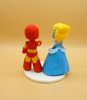 Picture of Iron Man and Cinderella wedding cake topper