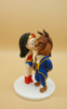 Picture of Wonder Woman and The Beast wedding cake topper