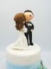 Picture of Cheek Kissing wedding cake topper, Bride kiss groom clay figurine