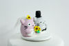 Picture of Totoro wedding cake topper, Japanese comic wedding theme.