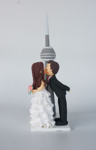 Picture of CN Tower wedding cake topper, Custom Kissing bride & groom with CN tower clay figurine