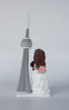 Picture of CN Tower wedding cake topper, Custom Kissing bride & groom with CN tower clay figurine