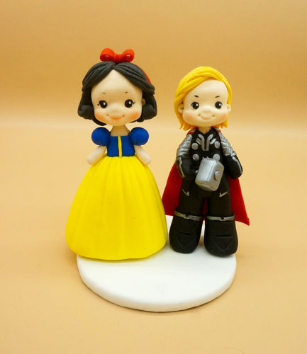 Picture of Princess Snow White and Thor Wedding Cake Topper