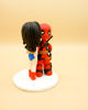 Picture of Wonder Woman and Dead Pool Wedding Cake Topper