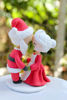 Picture of First Christmas Married Figurine, Kissing Mr & Mrs Santa Claus