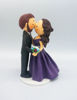 Picture of Kissing Bride & Groom cake topper,  purple theme wedding cake topper