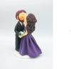 Picture of Kissing Bride & Groom cake topper,  purple theme wedding cake topper