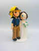 Picture of Fireman wedding cake topper, Firefighter and Bride cake topper
