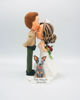 Picture of Police and Nurse with a dog wedding cake topper, Kissing forehead wedding cake topper