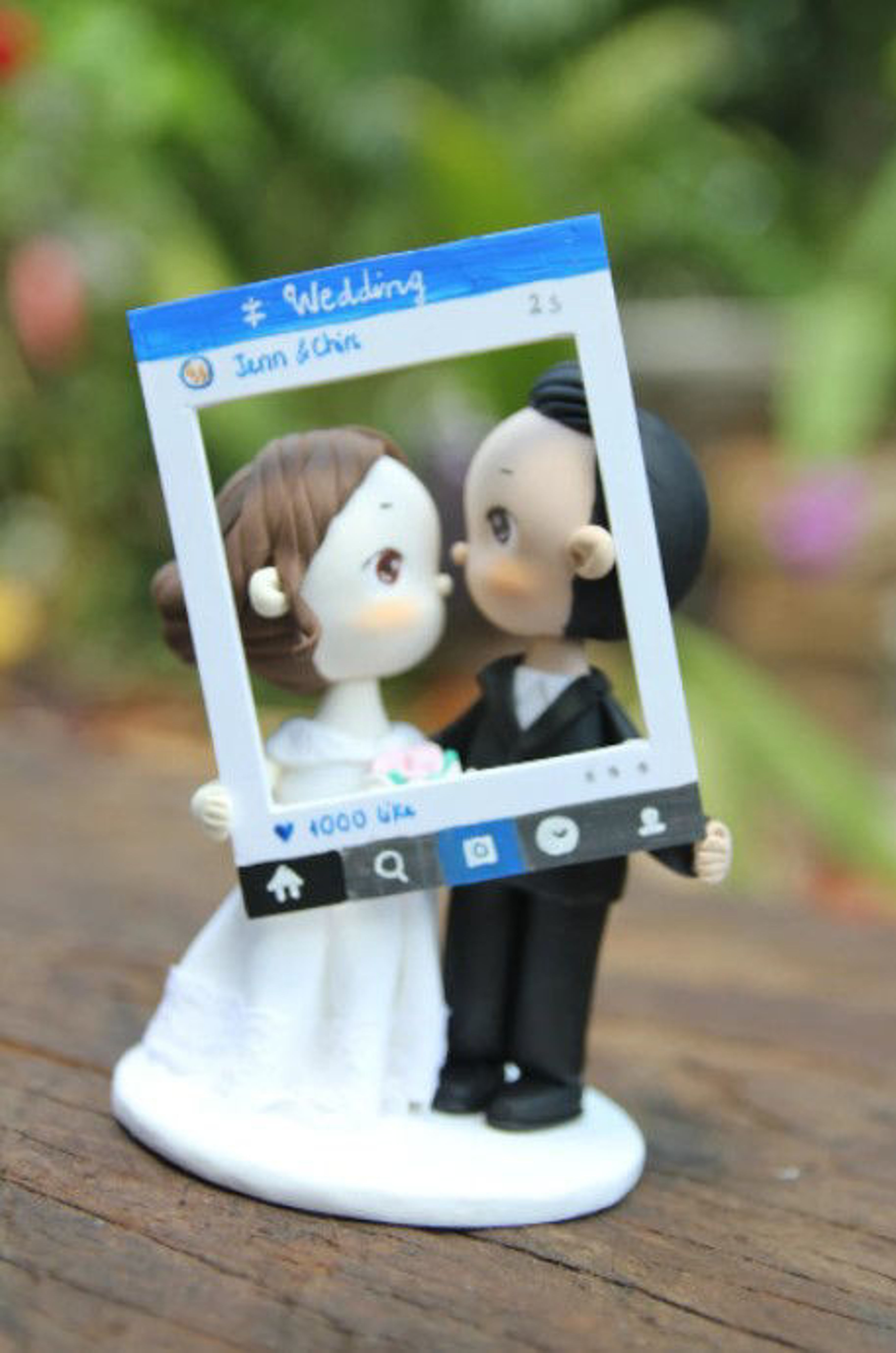 Picture of Facebook wedding cake topper