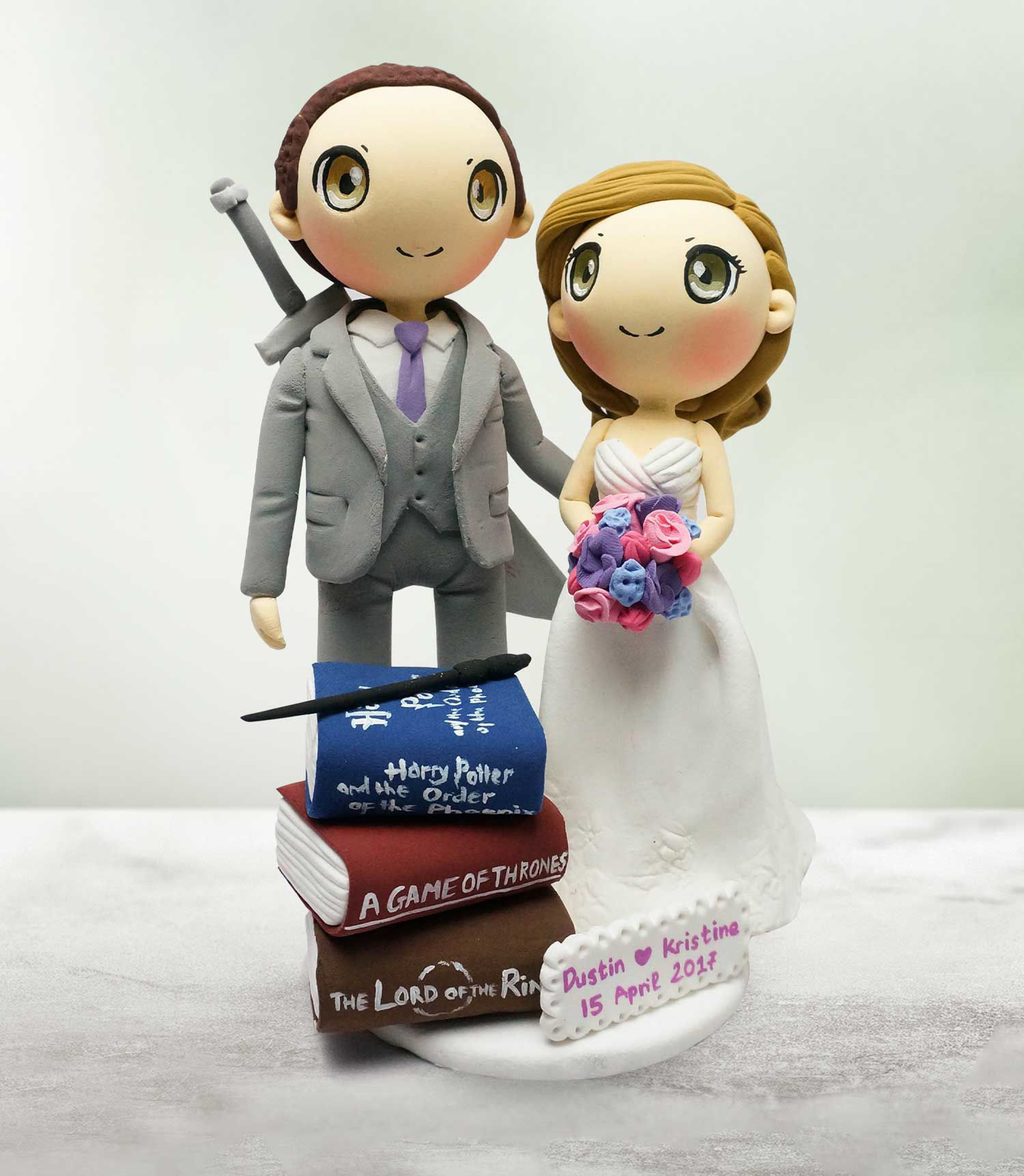 Picture of GOT wedding cake topper, the lord of the rings wedding topper