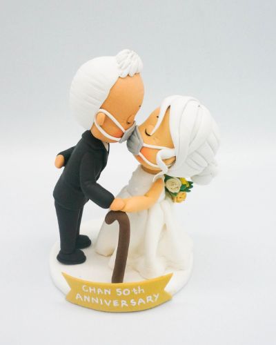 Picture of 50th year anniversary wedding cake topper