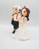 Picture of Firefighter and nurse wedding cake topper