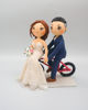 Picture of Bicycle bride and groom wedding cake topper