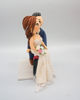 Picture of Bicycle bride and groom wedding cake topper