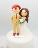 Picture of Football fan wedding cake topper, custom groom cake topper