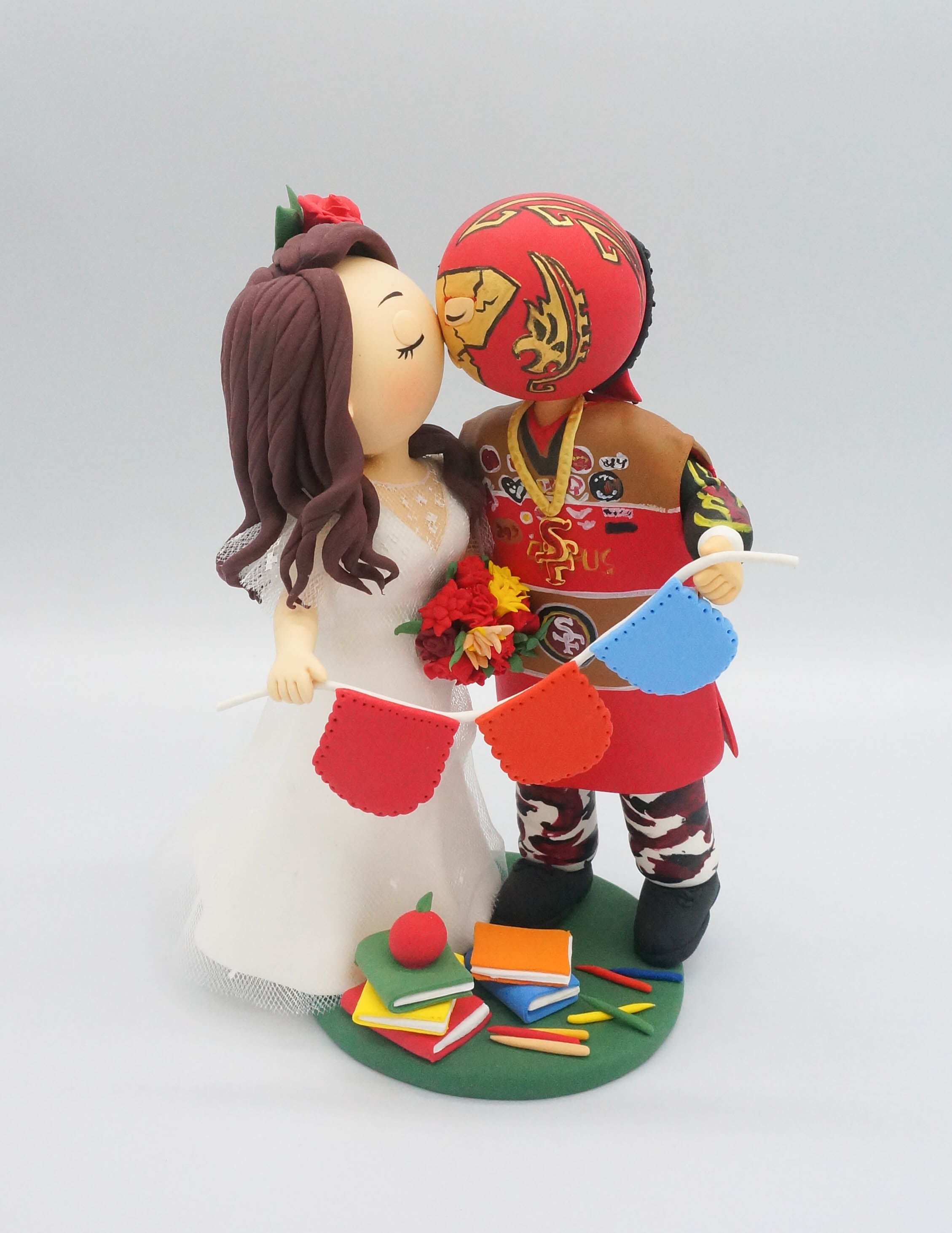 World Cake Topper. San Francisco 49ers fan groom & school teacher bride  wedding cake topper