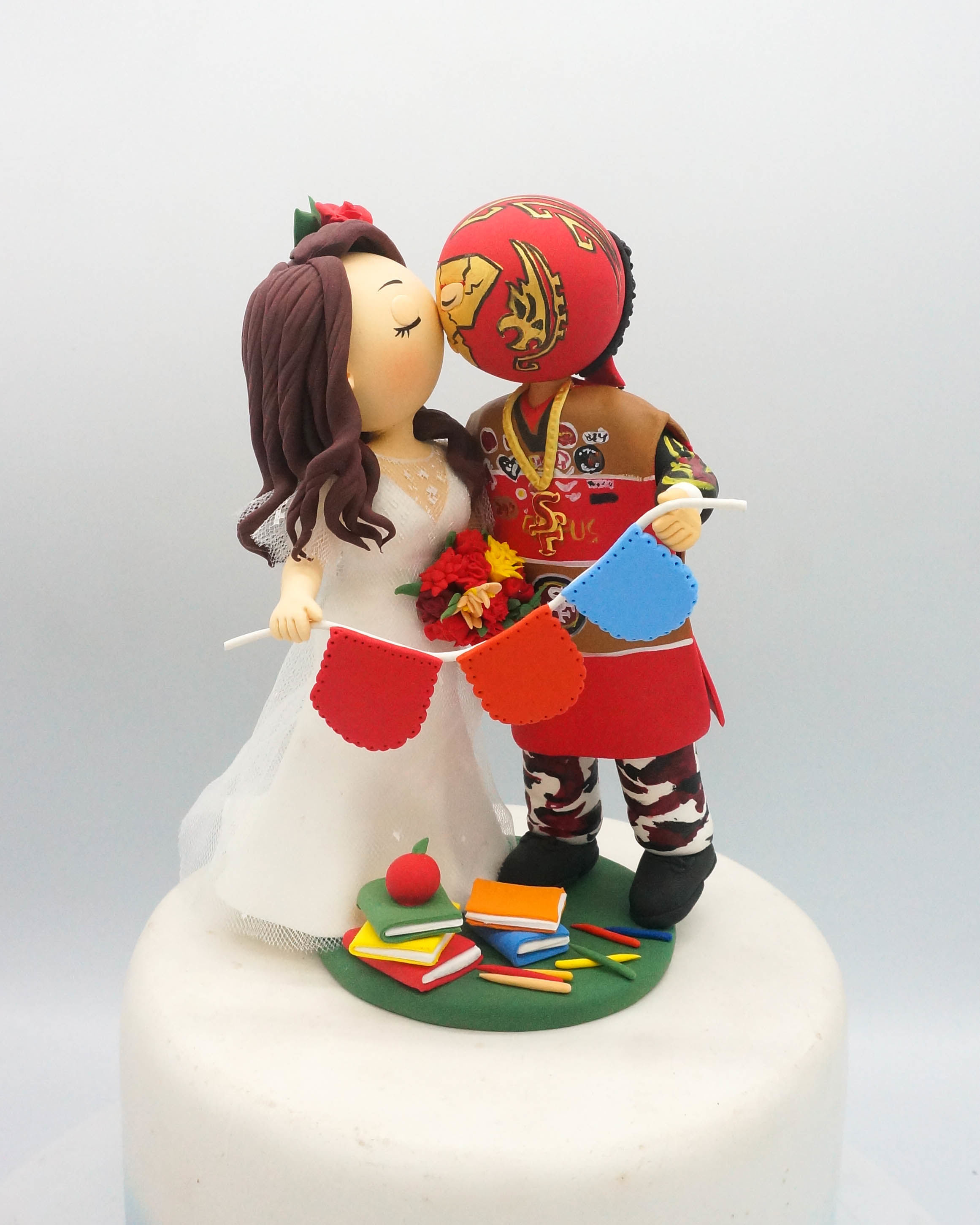 World Cake Topper. San Francisco 49ers fan groom & school teacher bride  wedding cake topper