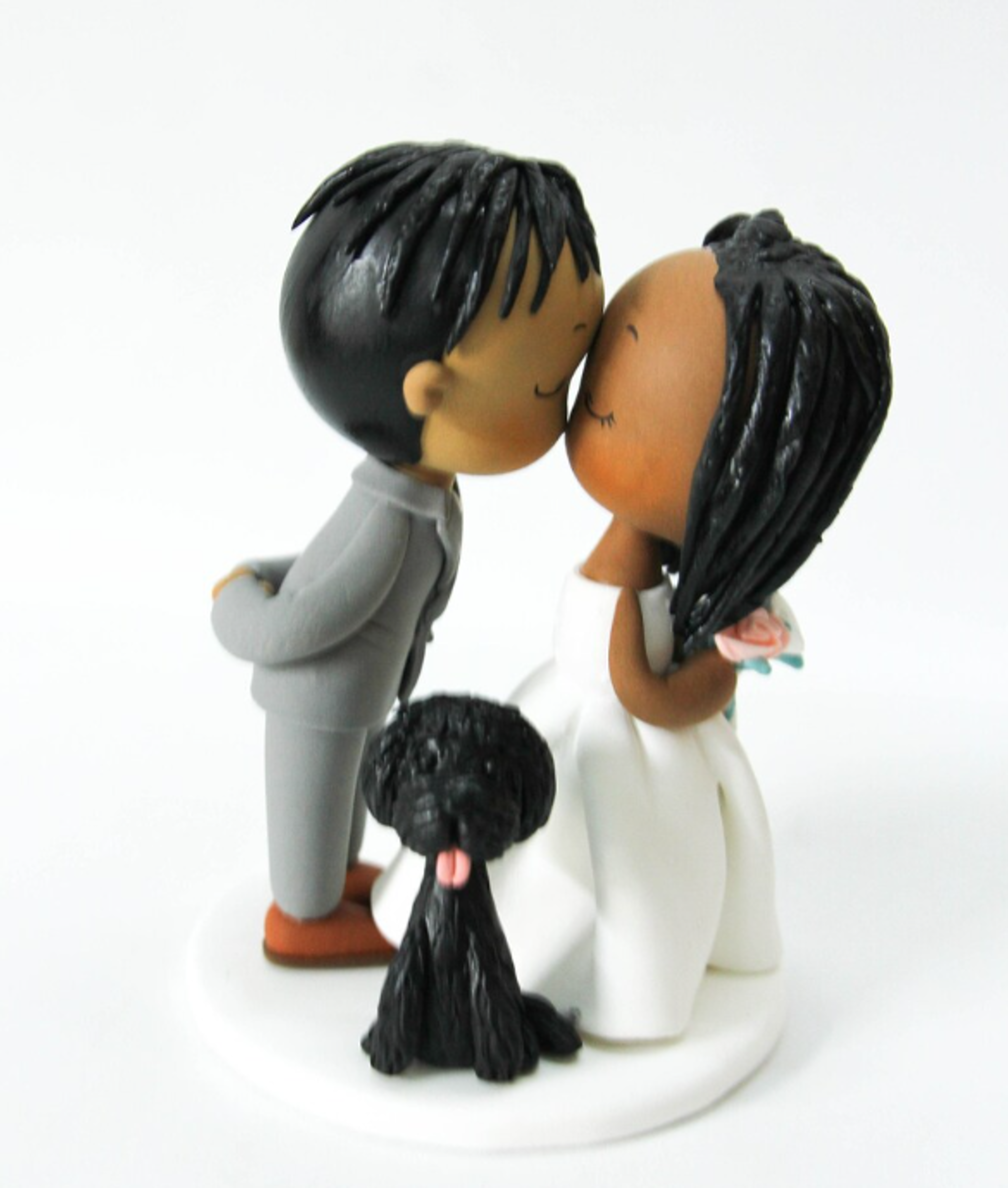 Picture of Ghana wedding cake topper, bride and groom wedding cake topper with dog