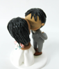 Picture of Ghana wedding cake topper, bride and groom wedding cake topper with dog