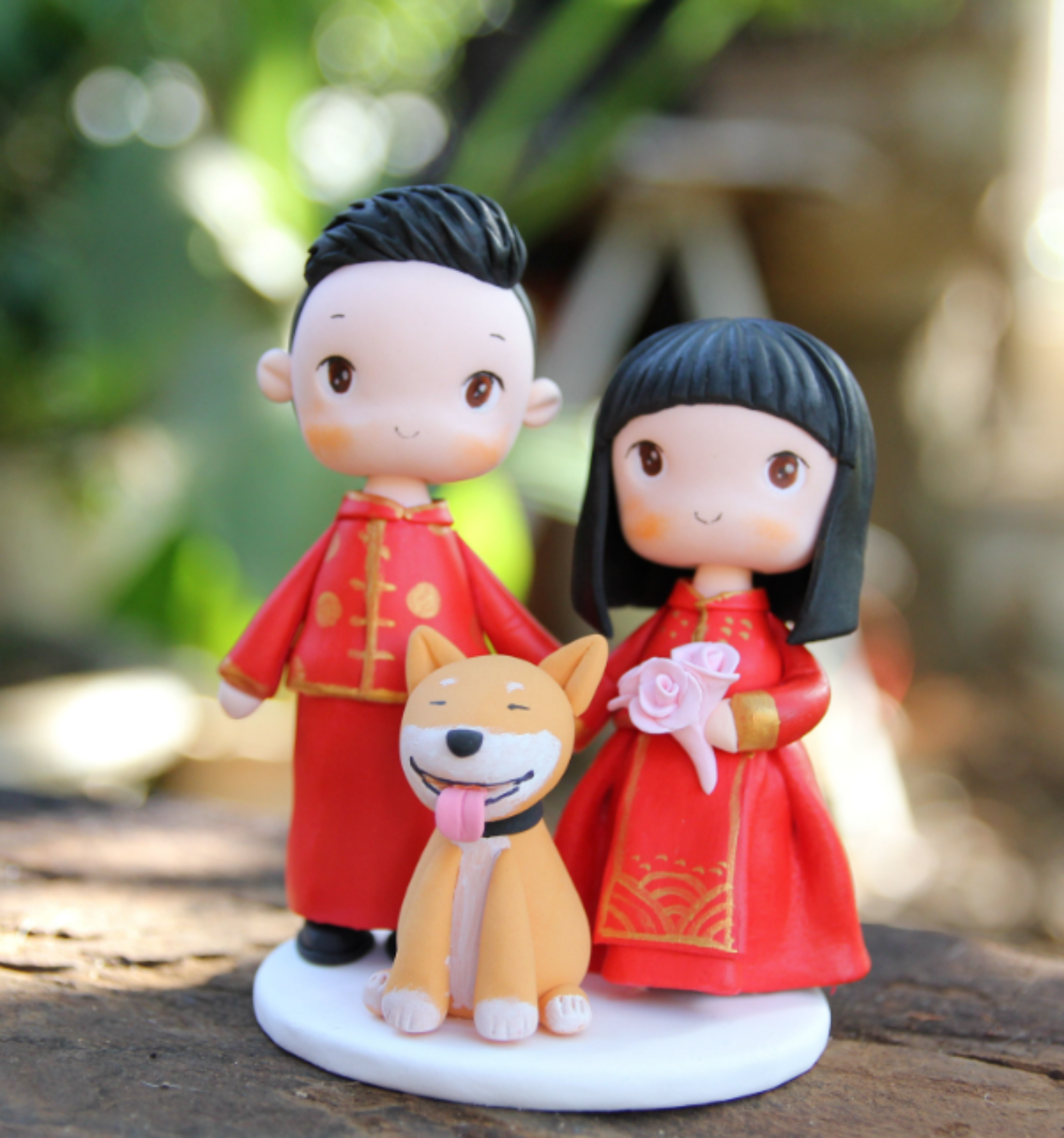 Picture of Chinese Wedding Cake Topper with Dog, Bride & Groom with Dog clay figurine