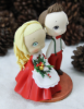 Picture of Christmas Wedding Cake Topper, First Christmas as Mr & Mrs figurine