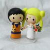 Picture of Son Goku and Sailor Moon wedding cake topper- Anime inspire wedding theme