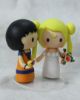 Picture of Son Goku and Sailor Moon wedding cake topper- Anime inspire wedding theme