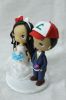 Picture of Pokemon and Hello Kitty wedding cake topper, Anime lover and Gamer wedding theme