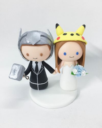 Picture of Thor groom and Pokemon bride wedding cake topper, Avengers inspire wedding