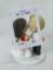 Picture of Hinge wedding cake topper, Funny wedding cake topper, love story teller topper