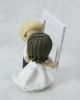 Picture of Hinge wedding cake topper, Funny wedding cake topper, love story teller topper