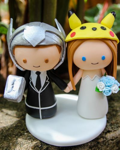Picture of Thor groom & Pikachu bride Wedding Cake Topper, Movie inspire wedding theme, Game Commission Wedding topper