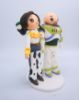 Picture of Toy Story Wedding Cake Topper,  Buzz Lightyear & Jessie Bride Groom Cake Topper