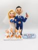 Picture of Electric Technician Groom & Blonde hair bride Wedding Cake Topper with Dogs, Muscular Groom Figurine
