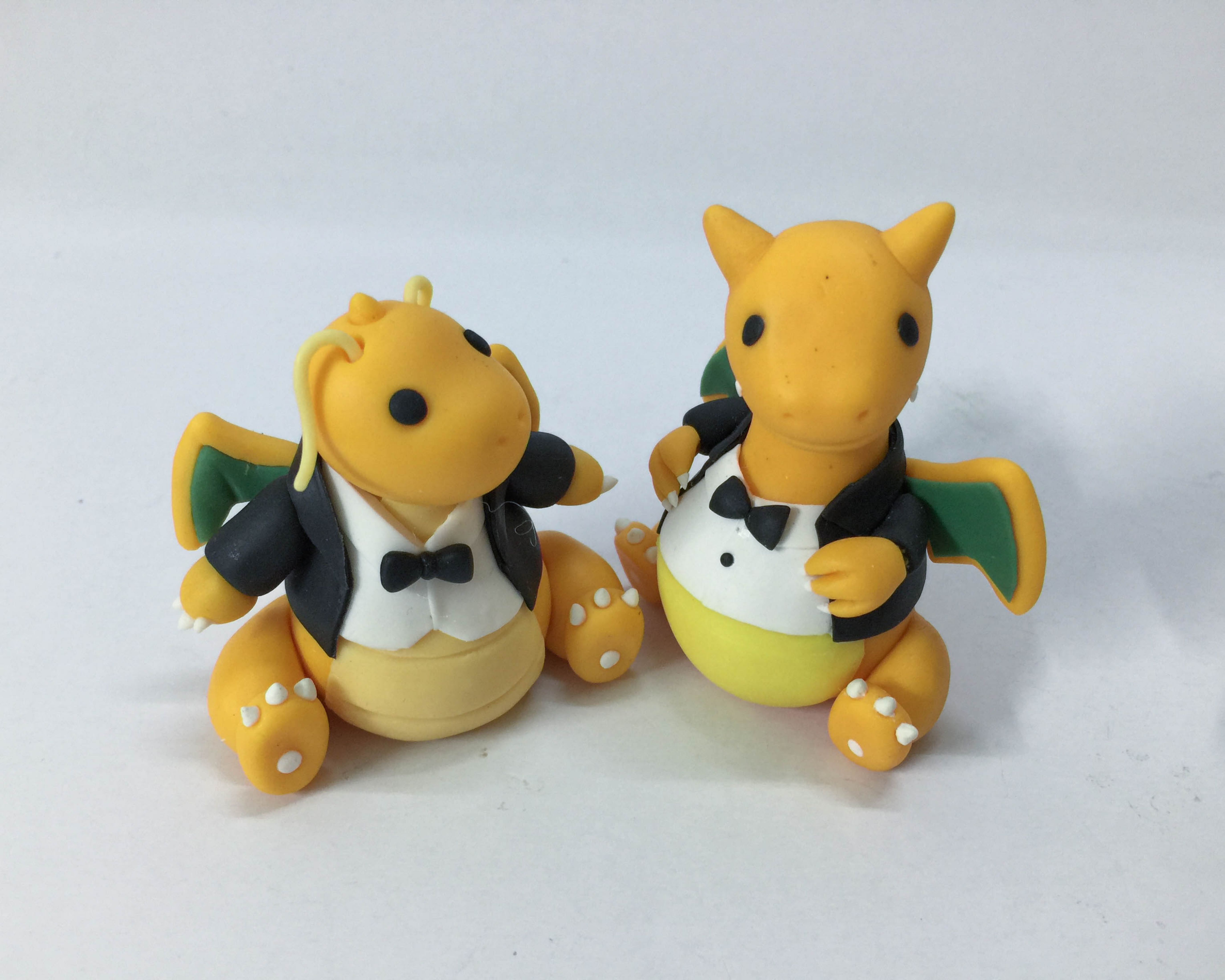 Picture of Charizard and Dragonite wedding cake topper, Pokemon wedding cake topper, Gay wedding cake topper