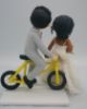 Picture of Bicycle Wedding Cake Topper, Office Romance Wedding Cake Topper, Interracial Bride & Groom Figurine