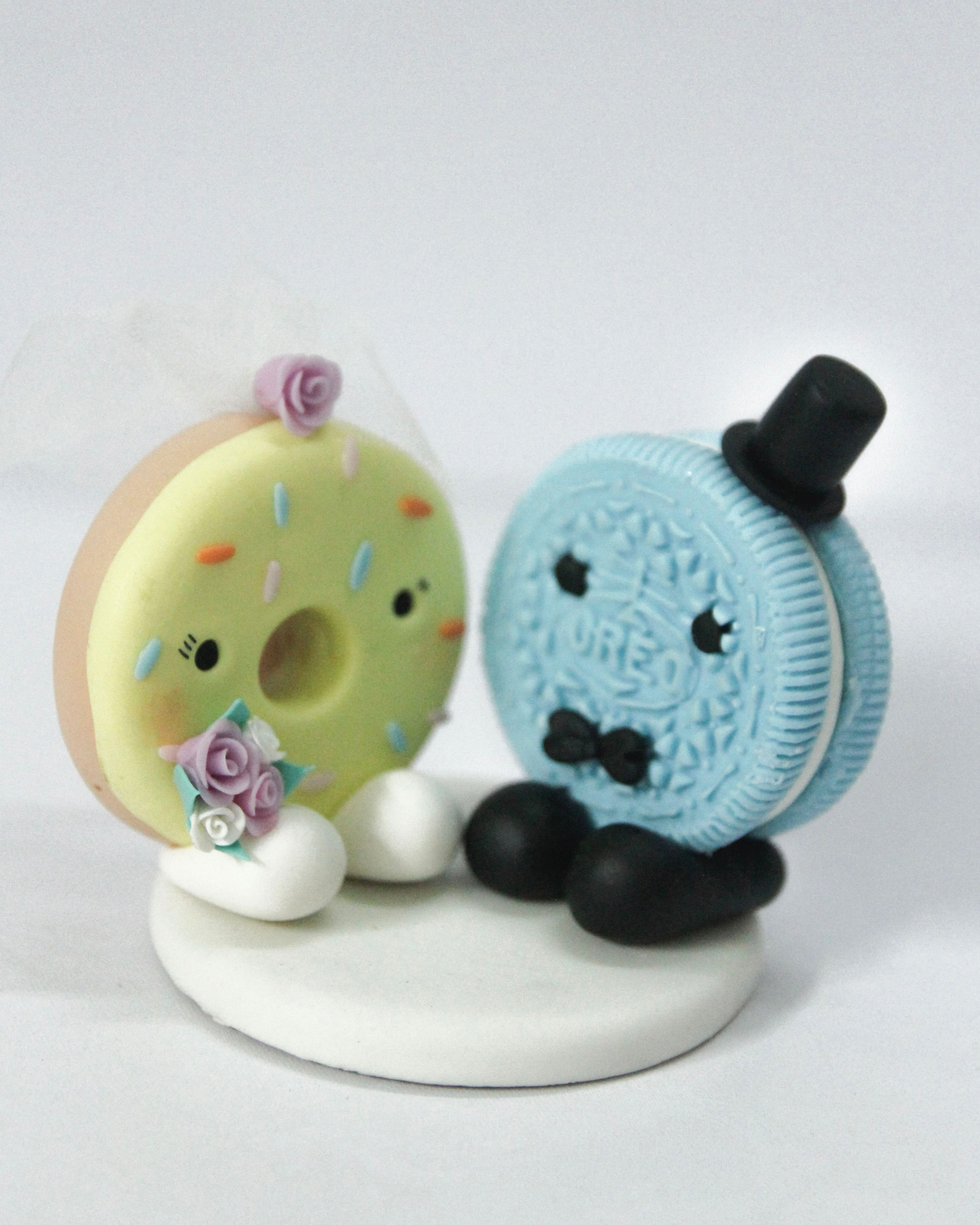 Picture of Donut Bride & Oreo Groom Wedding Cake Topper, Baker Wedding Cake Topper, Pink & Blue wedding theme